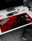40x20 inches anime desk pad showing Alucard grinning, pistol raised, marked glove and ribbon tie.