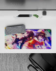 Megumin and Komekko from KonoSuba anime on a 28x12 inch mouse pad, featuring vibrant purples, pinks, and golden flares.