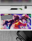 Anime mouse pad 32x16 inches featuring Megumin and Komekko from KonoSuba, vibrant magical scene with purples and golds.