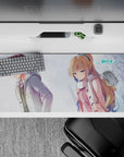 36x16 inches anime desk pad in pastel blue-gray snow scene, calm moody vibe with soft winter light.