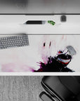 Anime desk pad 36x16 inches featuring Kaneki from Tokyo Ghoul, showcasing his sinister smile, white hair, and glowing red eye.