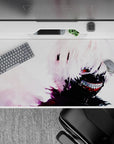 Anime desk pad 40x20 inches: Features Kaneki from Tokyo Ghoul with white hair and red eye, blending chaos and allure.