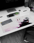 Anime mouse pad 36x16 inches featuring Tokyo Ghoul's Kaneki with white hair, red eye, and jagged teeth, creating a striking contrast.