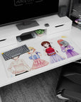 Anime desk pad 36x16 inches showing four friends: blue bow, blonde frills, plaid skirt, lavender lace.