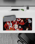 28x12 inches anime desk mat with electric red glow, inky wing shapes, and bold mischievous classroom vibe.