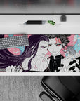 36x16 inches desk pad showcasing Tanjiro and Nezuko Kamado, with vibrant colors and intricate design, perfect for passionate anime fans.