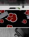 Villain-core anime desk pad 40x20 inches in deep black with crimson red clouds and white outlines.