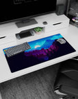 Modern 32x16 inches mouse pad featuring moonlit mountain landscape, with deep blues, purples, and a full moon for a peaceful desk design.