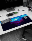 Artistic 36x16 inches mouse pad featuring moonlit mountain landscape, deep blues, purples, and a full moon for a serene workspace aesthetic.