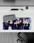 Cozy snowy night anime girl mouse pad 28x12 inches in soft blues and violet glow with cream and pink scarves.