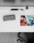 Bright orange frills and cool teal contrast on a 14x10 inches anime girl mouse pad with playful, chaotic vibes.