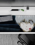 Anime desk pad 36x16 inches featuring a character with a glowing red eye and muted grays, perfect for dark anime fans.