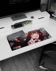 Black-haired anime girl grinning with a playing card, casino confetti on a 28x12 inches mouse pad.