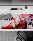 Striking 36x16 desk pad highlights Zero Two's fierce energy and mecha's dominance with vivid details