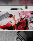 Powerful 40x20 desk pad showcases Zero Two and her towering mecha for fans of raw power and loyalty