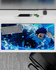 High-quality 32x16 inch mouse pad showcasing Tanjiro's intense action and vibrant energy for Demon Slayer fans
