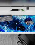 Sleek 36x16 inch desk pad featuring Tanjiro's dynamic water splashes for fans of Demon Slayer's action-packed themes