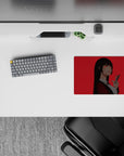 Bold red 14x10 inches anime mouse pad with cool dangerous smile, crisp blazer, minimalist vibe.