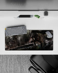 Compact yet impactful 28x12 inch mouse pad with Guts in battle stance for anime and gaming setups