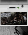 High-quality 32x16 inch mouse pad showcasing Guts in an intense action pose for gaming and anime fans