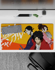 32x16 inches anime mouse pad in bold orange heat with red, indigo, and pink accents, street-poster vibe.