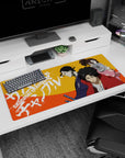 36x16 inches anime desk pad showing red haori fighter staring ahead, indigo dual-swordsman, and pink girl warning.