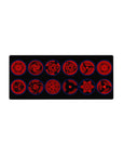 28x12 inches anime mouse pad with Sharingan eye lineup, Mangekyo patterns, and tomoe on dark background.