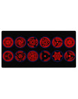 32x16 inches anime mouse pad with a lineup of Sharingan eyes, Mangekyo swirls, and sharp tomoe icons.