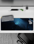 Stormy blues and inky black 32x12 inches mouse pad with calm, moody cosmic lightning streaks.
