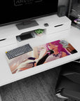 Anime girl mouse pad 32x12 inches showing winged girl lounging sideways, finger to lips, neon gaze.