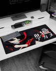 Artistic 36x16 inches mouse pad with Akame in a bold minimalist style, featuring strong lines, vivid contrast, and splattered red details.