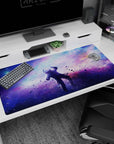 Starry violet cloud and blue nebula scene desk pad 40x20 inches with floating dust and tiny stars.