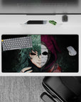 Anime mouse pad 32x16 inches featuring a haunting stare and emotionless mask; gritty textures, eerie colors.