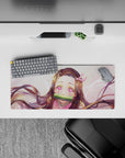 Nezuko anime mouse pad 28x12 inches featuring starlit eyes, pink highlights, and sparkles, perfect for workspace decor.