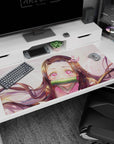 Nezuko anime desk pad 40x20 inches with starlit eyes, pink highlights, and sparkles for a calming workspace.