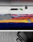 36x16 inches mouse pad with a sunset and mountains, blending fiery skies with serene peaks for a peaceful atmosphere.
