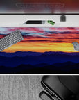 40x20 inches mouse pad with a sunset scene, blending fiery skies and serene mountains, creating a tranquil, breathtaking atmosphere.