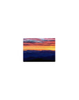 Classic 14x10 inches mouse pad with a vibrant sunset and serene mountains, featuring fiery skies for a peaceful atmosphere.