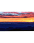 Mouse pad featuring a vibrant sunset with fiery skies and serene mountains, 40x20 inches, for a calm, nature-inspired vibe.