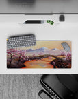 28x12 inches mouse pad with cherry blossom landscape, capturing the peaceful beauty of snow-capped mountains and delicate pink blossoms.