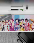 Pastel stripe anime girl desk pad 36x16 inches, soft cel shading, playful cozy mischievous vibe.