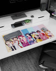 32x16 inches anime girl mouse pad showing a group of mischievous girls posing together on pastel stripes.