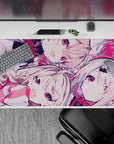 Pink and crimson anime desk pad 40x20 inches, candy-bright contrast and cozy chaotic best-friends vibe.
