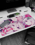 40x20 inches anime desk pad showing two cute girls with pale hair, ruby eyes, and ribbon accents.
