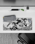 Compact yet detailed 28x12 inch mouse pad showcasing Tanjiro and Nezuko's fierce determination