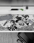 Sleek 36x16 inch desk pad featuring the fierce sibling bond of Tanjiro and Nezuko for anime enthusiasts