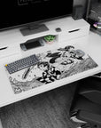 Durable 32x16 inch mouse pad with manga-inspired design, perfect for gaming and anime setups
