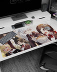 Anime girl desk pad 40x20 inches featuring girls crammed together as one guards a steaming bowl like treasure.