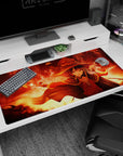 Megumin KonoSuba anime mouse pad 40x20 inches; fiery scene with cape flaring, capturing magic explosion moment.