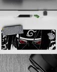 32x12 inches black-and-white anime mouse pad with a crimson Sharingan pop and moody, sharp stare vibe.